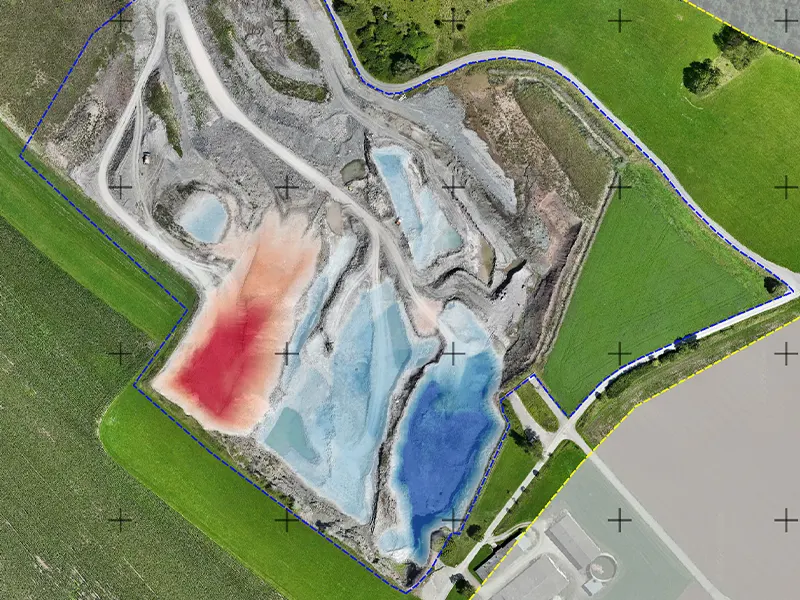 Cut/Fill Map for Mass Determination and Volume Change Analysis Cut/fill change map comparing two 3D survey dates, with color-coded areas showing terrain height differences for volume and mass determination.